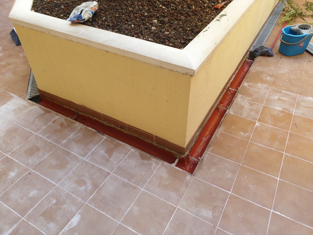 Jardinera reparada